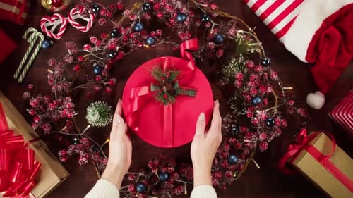 Opening Present Box on Table Top View