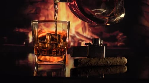 Whiskey Pour With Fireplace and Cigar