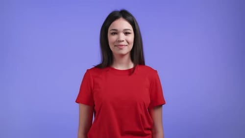 Smiling Young Woman Wearing a Red T-Shirt