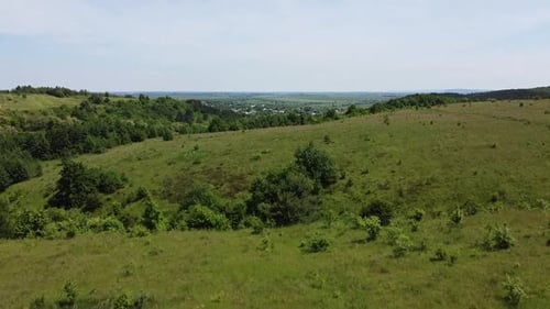 Aerial drone view of a flying over the rural agricultural landscape.