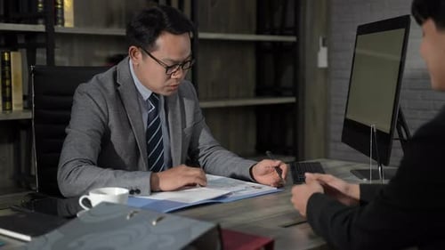 Professional Man Discussing Business in Modern Office