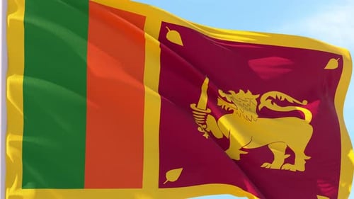Waving Sri Lanka Flag Against Blue Sky