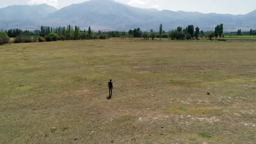 Man Walking In Countryside