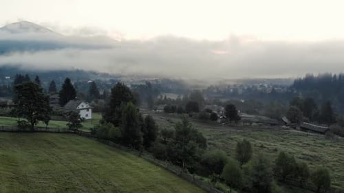 Morning Fog Over Mountain Village
