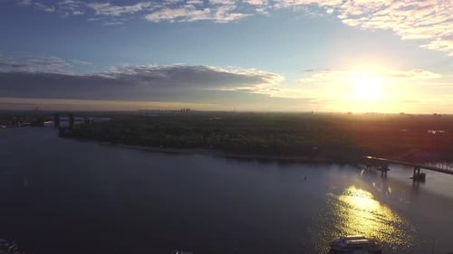 Evening Sunset Reflecting in City River, Aerial View Evening City on Sunset