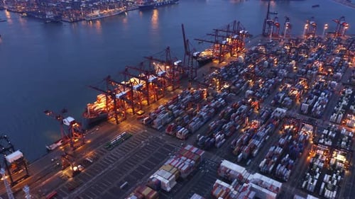 Aerial top view of container in logistics or shipping business at Victoria Harbour, Hong Kong.