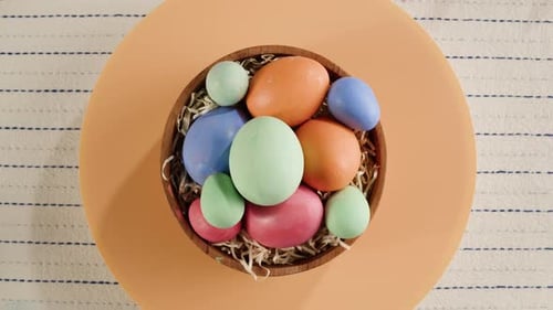 Pastel Easter Eggs in a Wooden Bowl