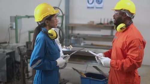 engineer cooperation male and female technician maintenance control relay robot