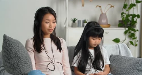 Asian Korean Woman Mom with Little Daughter Millennial Girl Parent and Ethnic Child of School Age