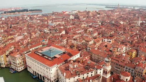 narrow canals and orange rooftops in Venice