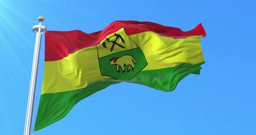 Realistic Waving Flag of Saxony-Anhalt Against Blue Sky