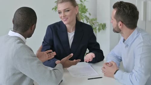 Slow Motion of Cheerful Male and Female Business People Talking in Office