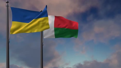 Drapeau de Madagascar agitant avec le drapeau national de l'Ukraine - 4K