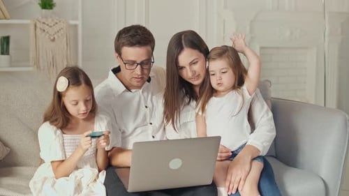 Family Relaxing Together at Home with Technology