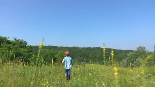 Running Boy by the Forest Edge