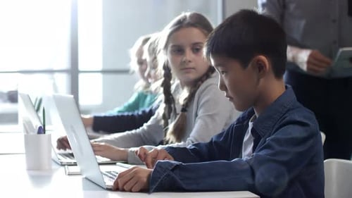 Teacher Helping Students