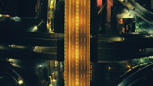 Top Down City Illuminate Roadway at Night Cityscape Aerial View