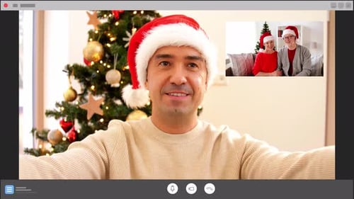 Man Video Calling Family During Christmas Holiday