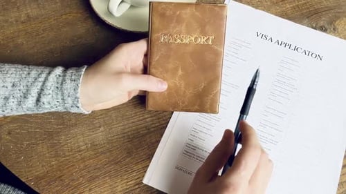 Filling out a Visa Application with Passport