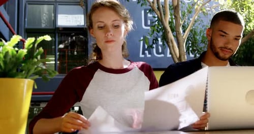 Executives working in cafeteria 4k