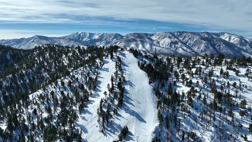 Aerial View of Mountain Ski Resort with Beautiful Winter Landscape