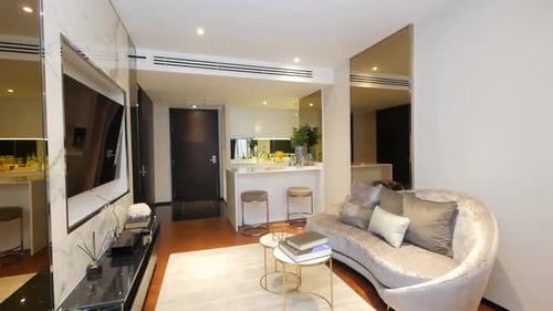 Fully Decorated Living Room with Stylish Furnitures and Lighting