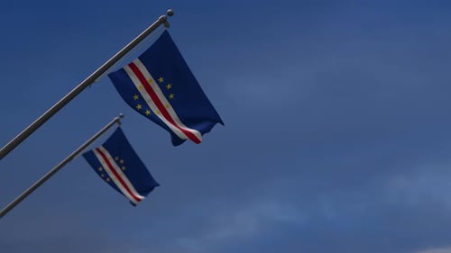Cape Verde Flags Waving Against Blue Sky