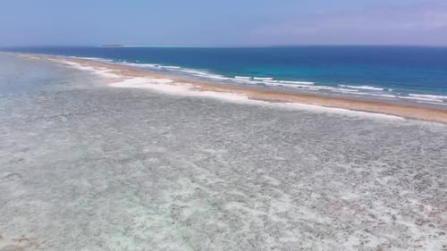 Ocean Coastline and Barrier Reef at Low Tide Zanzibar Matemwe Aerial View