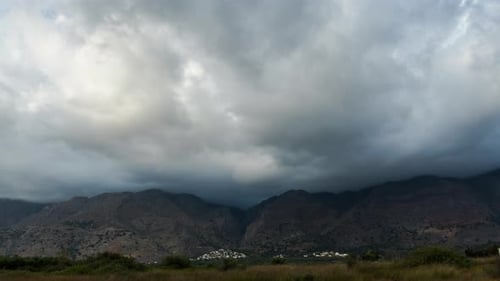 Time Lapse landscape of Clouds covered Mountains. Clouds moving