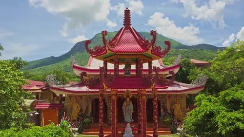 Drone Removes From Temple Shows Courtyard Against Hills Sky