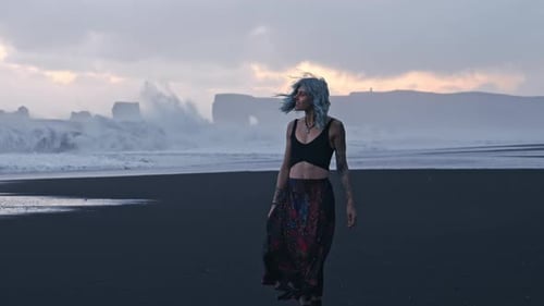 Smiling Cool Girl On Black Sand Beach