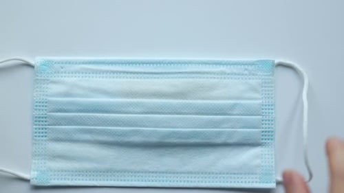 Surgical Mask and Letters Spelling "Free"