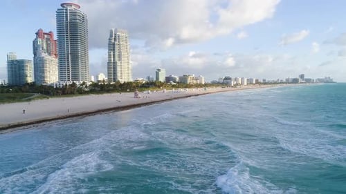 Miami South Beach Coastline Slow Moving Aerial Over Waves Towards Shore