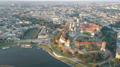 Aerial View of Royal Wawel Cathedral and Castle in Krakow, Poland, with Vistula River, Park, Yard