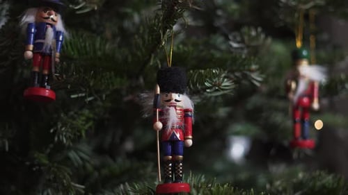 Decoration Toy Nutcracker on Christmas Tree. 4K Dolly Slider Shot.