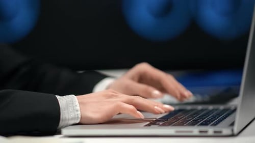 Closeup Business Female Hands in Suit Typing on Keyboard Modern Laptop
