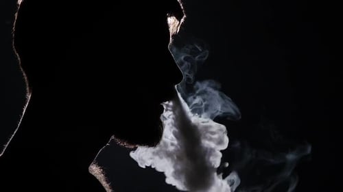 Man Exhaling Vapor From Vape, Silhouette Man Exhaling Vapor From Vape, Silhouette
