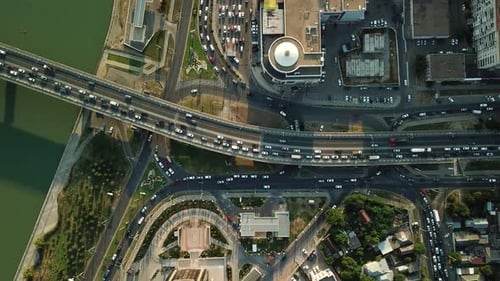 Aerial Top Down View From Drone of Traffic Bridge City with Driving Car
