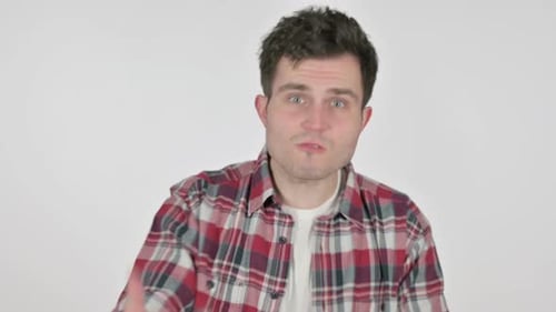 Young Man Speaking Directly to Camera in Studio