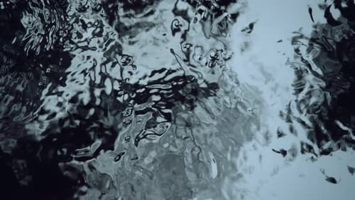 Waves on the Black Water of a Peat River or Lake