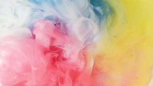 Colorful Ink Plumes Flowing Together in Abstract Design
