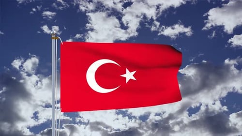 Waving Turkish Flag on Flagpole with Blue Sky and Clouds