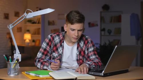Teen Studying Late at Night