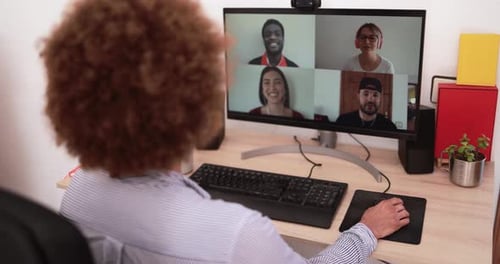 Woman Attends Virtual Meeting From Home Office
