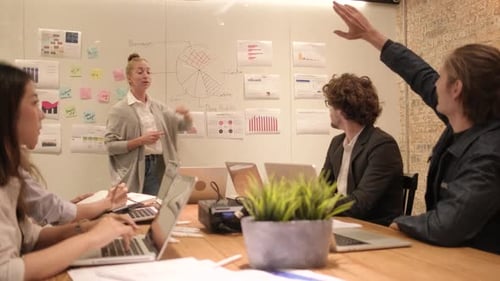 Meeting of multiracial professional teamwork with coworkers at the business office.