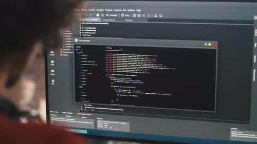 Coding on Computer Screen in Modern Workplace