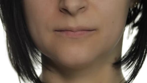 Woman Takes Pill, Drinks Water Close Up