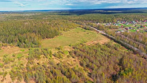 Aerial View of Fields with Forests on a Spring Sunny Day a Magical Landscape with Treetops Lakes in