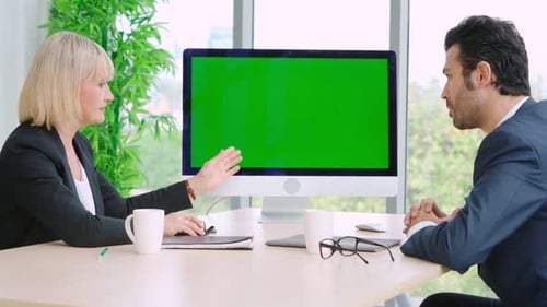Business People in the Conference Room with Green Screen