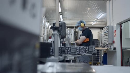 Quality Control Inspector In A Beer Factory Selective Focus